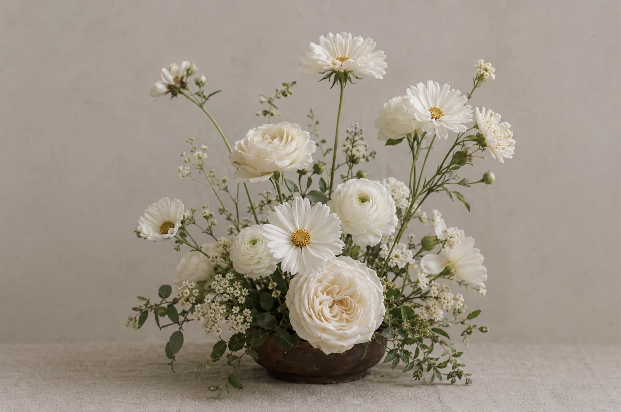 Quiet white and green sympathy arrangement by Hana Studio Vancouver