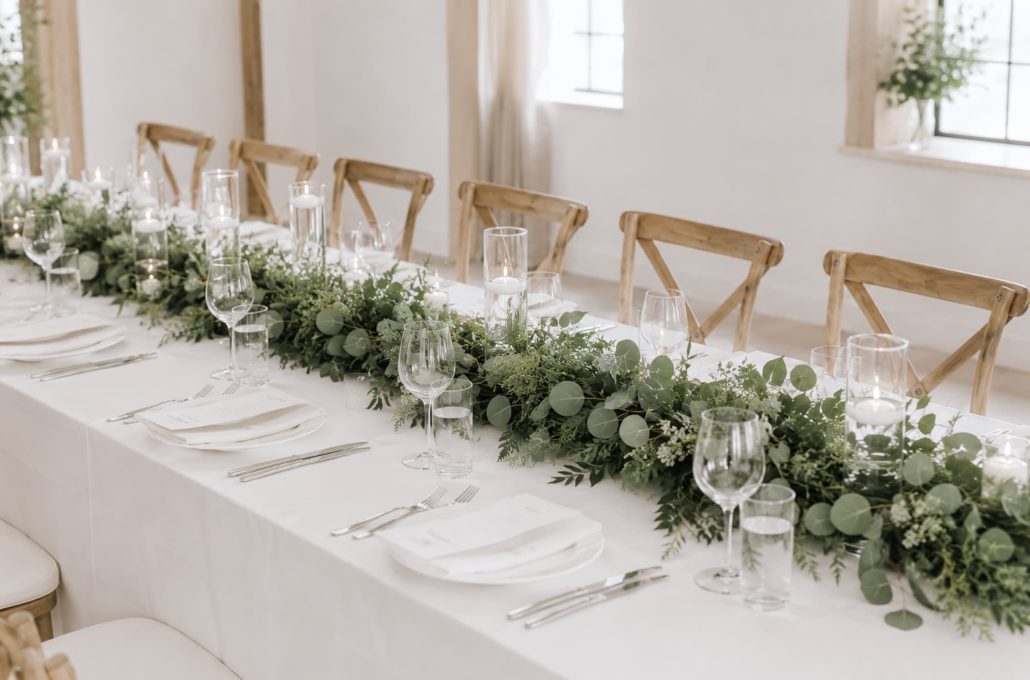 Reception table with greenery runner